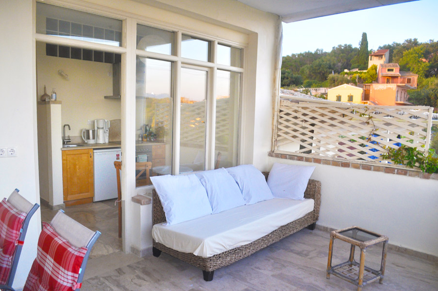 Apartment B - terrace and sofa