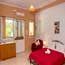 Studio B - bed and entrance